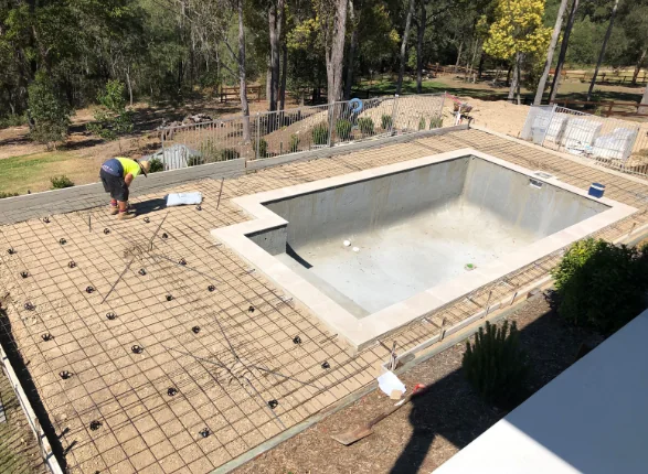 Empty swimming pool ready for renovation or removal